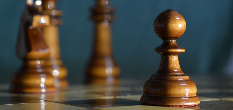 Housing - a pawn on a chess board