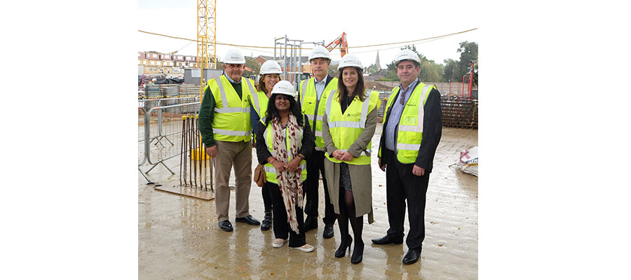 housing developments -  London Borough of Hounslow Councillor and Leader of the Council, Steve Curran; A2Dominion Development Director, Doreen Wright; Hounslow West Cllr, Bandna Chopra; A2Dominion CEO, Darryl Mercer; London Borough of Hounslow Assistant Director of Planning & Development, Sarah Scannell and A2Dominion Development Director, Danny Lynch at the Bath Road construction site.