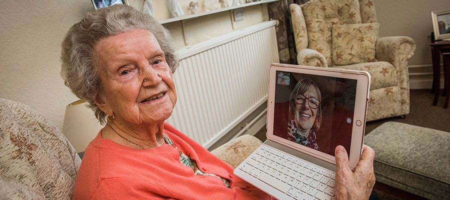Viewpoint housing association – an elderly tenant on videocall with Tap into IT